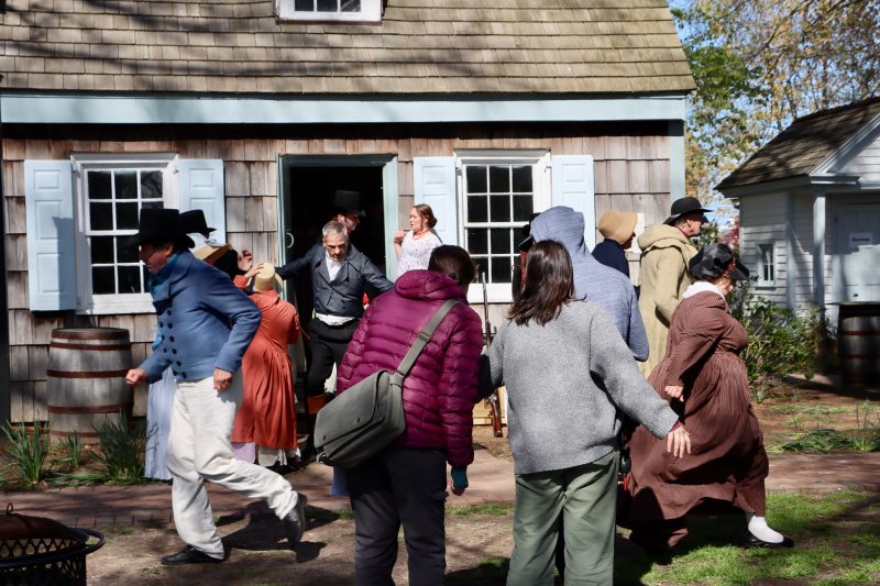 Actors sprint around the Sussex Tavern during one of the takes for the “Chaos” scene. It shows people rushing to get women and children to the safety of the armory near Blockhouse Pond during the British bombardment of Lewes during the War of 1812.